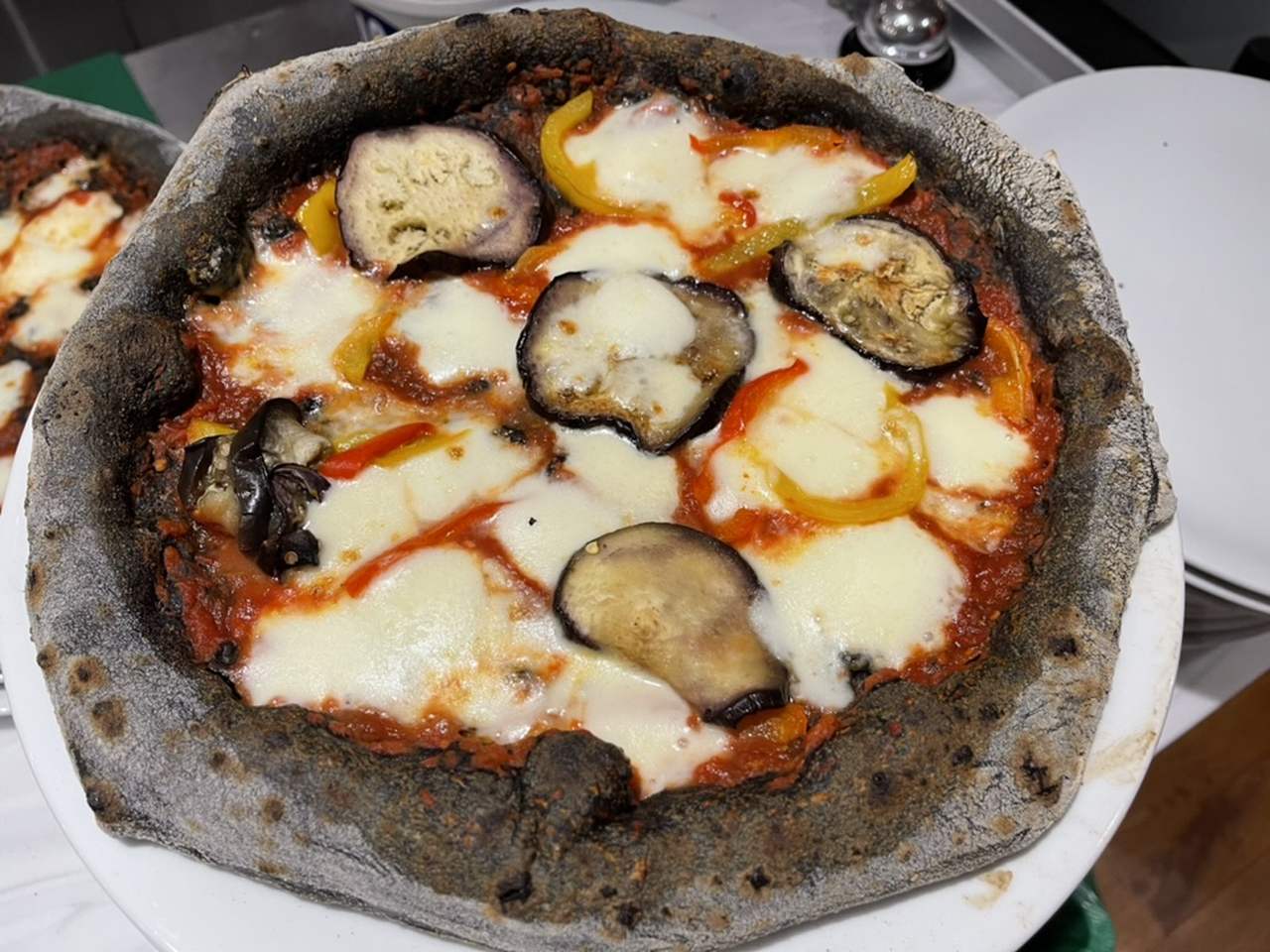 Vegetable charcoal pizza at Zia Lucia