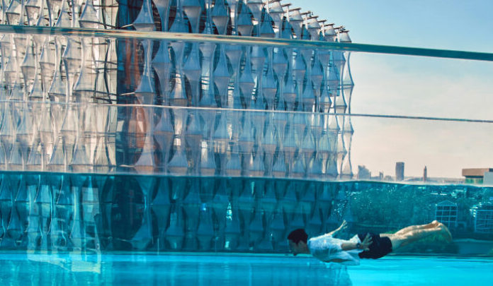 Would You Swim In A Floating Pool Suspended Between Two Skyscrapers Global Financial Market Review