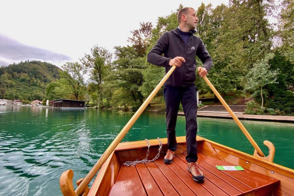 Pletnarstvo Rowing his Pletna Boat on Lake Bled in Slovenia