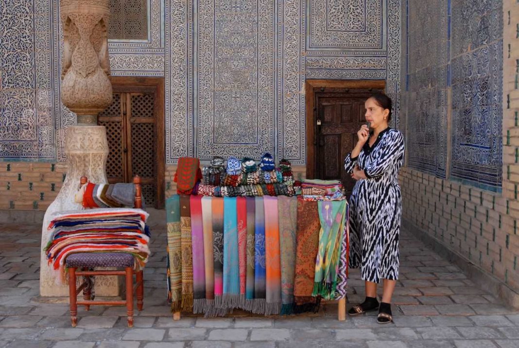 Souvenir seller within the harem at the Ichan Qala in Khiva, Uzbekistan