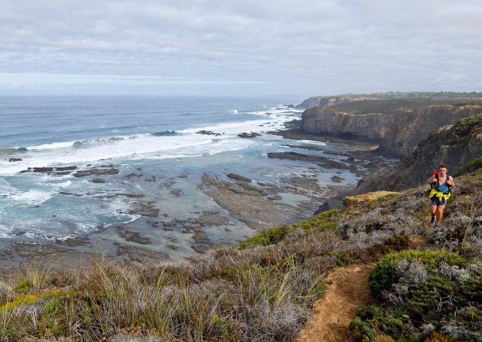 Walker on Clifftop track